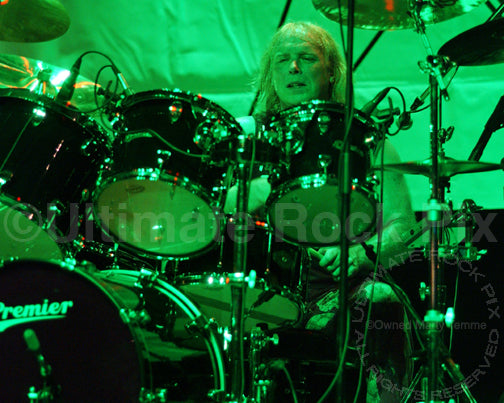 Photo of drummer Thomas Broman of Michael Schenker in concert by Marty Temme