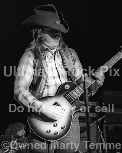 Photo of Toy Caldwell of The Marshall Tucker Band in concert in 1974 by Marty Temme