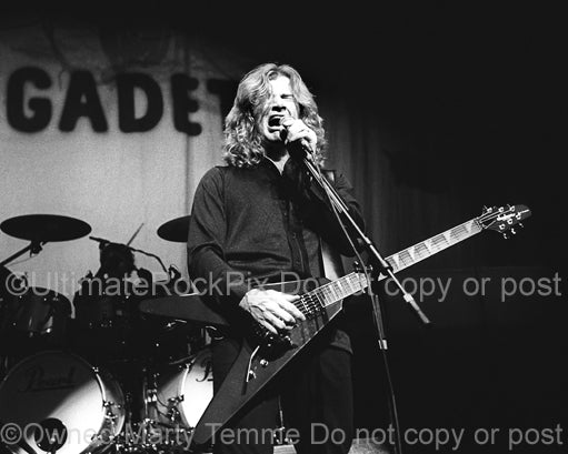 Black and white photo of Dave Mustaine in concert by Marty Temme