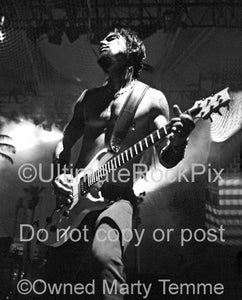 Black and white photo of Dave Navarro of Janes Addiction in concert by Marty Temme