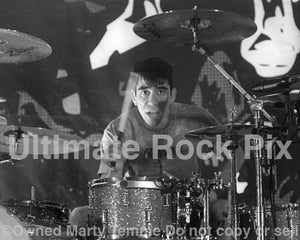 Photo of Cyrus Bolooki of New Found Glory in concert in 2002 by Marty Temme