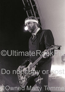 Black and white photo of guitarist Tom Dumont of No Doubt in concert in 2004 by Marty Temme