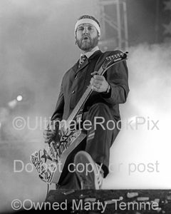 Black and white photo of Tom Dumont of No Doubt in concert in 2004 by Marty Temme