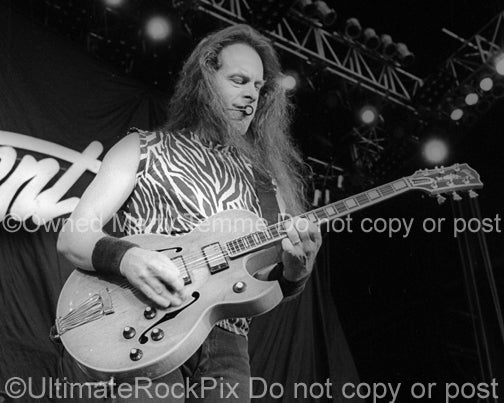 Black and white photo of Ted Nugent in concert in 2000 by Marty Temme