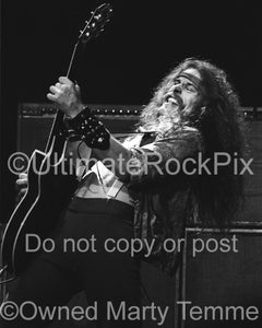 Photo of Ted Nugent in concert in 1977 by Marty Temme