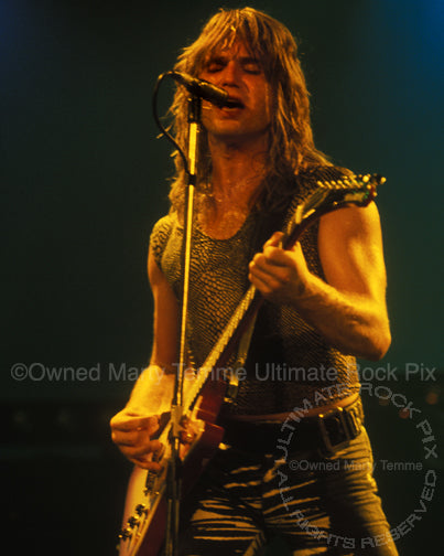 Photo of Charlie Huhn of Ted Nugent in concert in 1980 by Marty Temme
