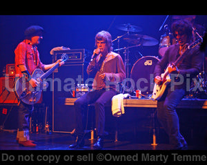 Photo of Sylvain Sylvain, David Johansen and Steve Conte of New York Dolls in concert by Marty Temme
