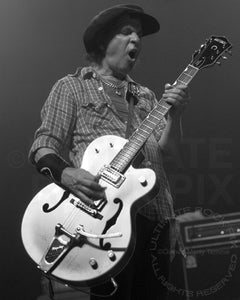 Black and white photo of Sylvain Sylvain of New York Dolls in concert in 2008 by Marty Temme