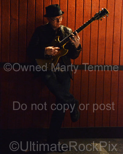 Photo of Chris Poland of Ohm during a photo shoot in 2012 by Marty Temme