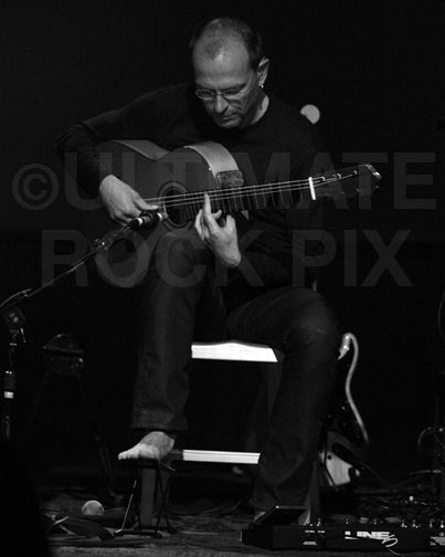 Black and white photo of Ottmar Liebert in concert