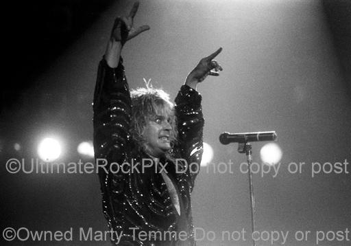 Photos of Ozzy Osbourne of Black Sabbath Raising His Arms to the Crowd in 1986 by Marty Temme