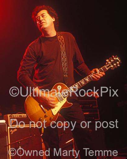 Photos of Jimmy Page playing his Les Paul Standard in Concert with The Black Crowes in 1999 by Marty Temme