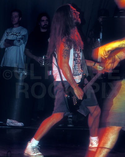 Photo of bass player Rex Brown of Pantera in concert in 1994 by Marty Temme