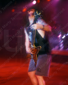 Photo of Darrell Abbott of Pantera in concert in 1994 by Marty Temme