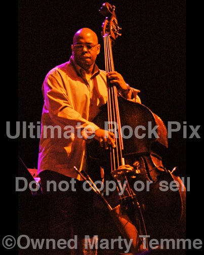 Photo of bass player Christian McBride of Pat Metheny in concert by Marty Temme