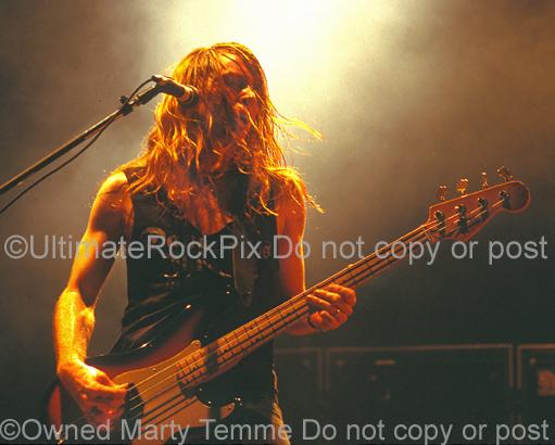 Photos of Bass player Jeff Pilson of Dokken Performing in Concert in 1995 by Marty Temme