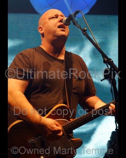 Photo of Black Francis of The Pixies in concert in 2009 by Marty Temme