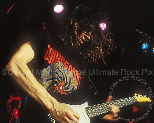 Photo of Mike McCready of Pearl Jam in concert in 1991 by Marty Temme