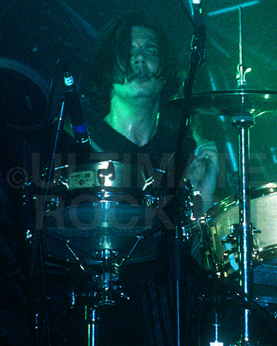 Photo of drummer Steve Hewitt of the band Placebo in concert by Marty Temme