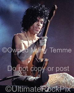 Photo of Singer-Songwriter and Guitarist Prince in Concert in 1984 by Marty Temme