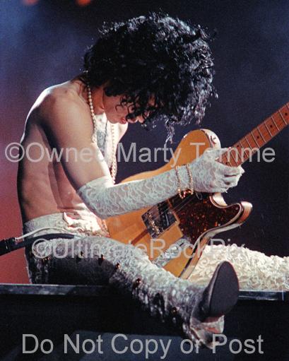 Photos of Prince Playing a Hohner Made Telecaster Style Guitar in Concert in 1984 by Marty Temme