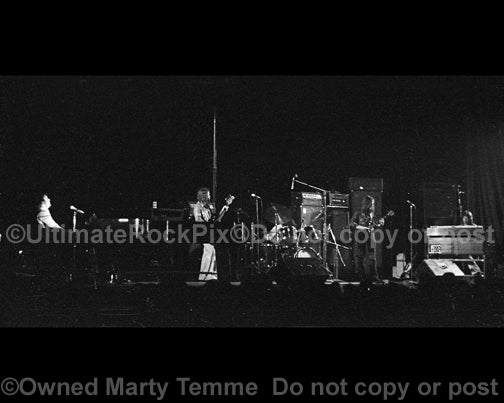 Photo of Gary Brooker and Procol Harum in concert in 1973 by Marty Temme