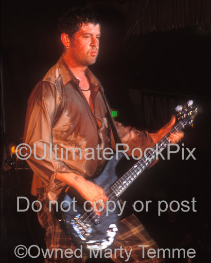 Photo of bassist Paul Raven of Prong in concert in 1994 by Marty Temme
