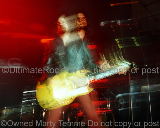 Photo of guitar player Tommy Victor of Prong in concert in 1994 by photographer Marty Temme