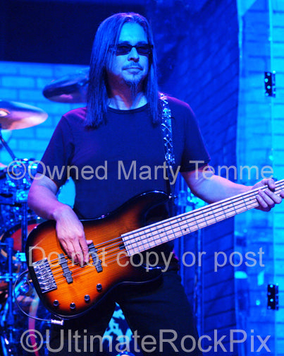 Photo of bassist Eddie Jackson of Queensryche in concert in 2006 by Marty Temme