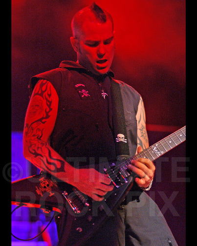 Photo of Mike Stone of Queensryche in concert in 2006 by Marty Temme