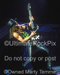 Photo of guitarist Chris DeGarmo of Queensryche in concert in 1989 by Marty Temme