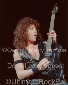 Photo of Michael Wilton of Queensryche in concert in 1985 by Marty Temme