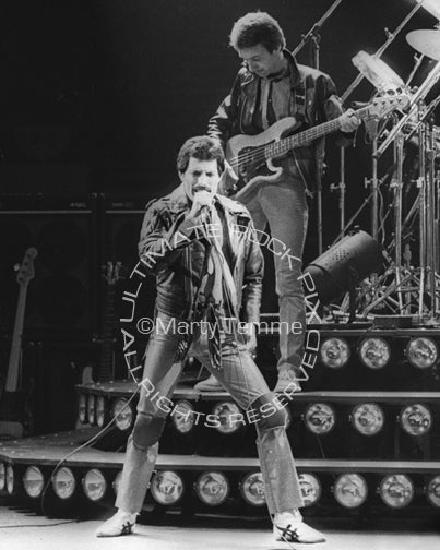 Black and white photo of Freddie Mercury and John Deacon of Queen by Marty Temme