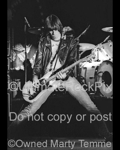 Photo of guitar player Johnny Ramone of The Ramones in concert in 1979 by Marty Temme
