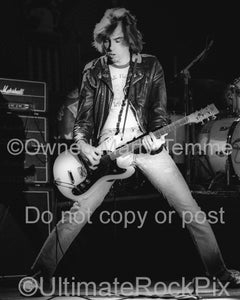 Photo of guitarist Johnny Ramone of The Ramones in concert in 1979 by Marty Temme