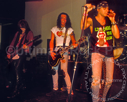 Photo of Kyle Kyle, Stephen Pearcy and Taime Downe in 1991 by Marty Temme