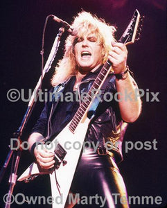 Photos of Guitar Player Robbin Crosby of Ratt in Concert by Marty Temme