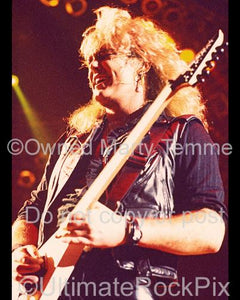 Photos of Guitarist Robbin Crosby of Ratt in Concert by Marty Temme