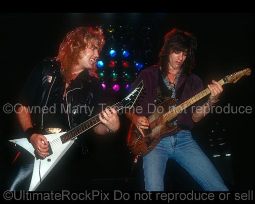 Photos of Guitar Players Robbin Crosby and Warren DeMartini of Ratt Playing Together Onstage in 1988 by Marty Temme