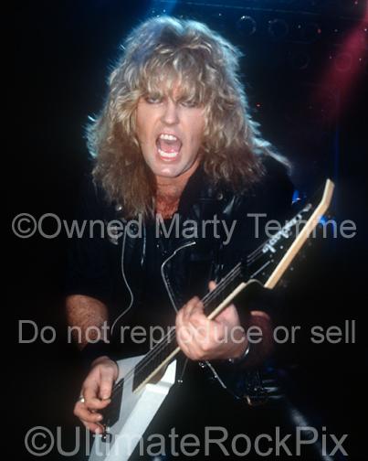 Photos of Robbin Crosby of Ratt Playing a Charvel Jackson Guitar in Concert in 1988 by Marty Temme