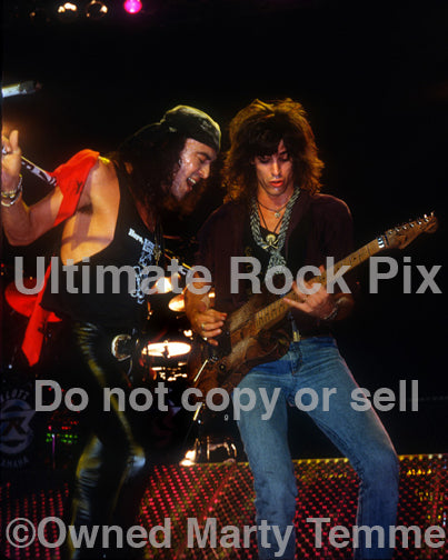 Photo of Stephen Pearcy and Warren DeMartini of Ratt in concert in 1988 by Marty Temme