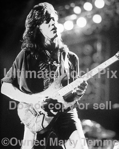 Black and white photo of Warren DeMartini of Ratt in concert in 1989 by Marty Temme