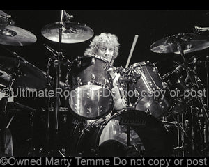 Photo of Alan Gratzer of REO Speedwagon in concert in 1981 by Marty Temme