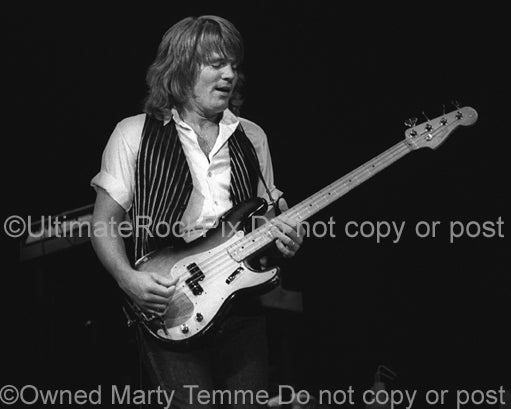 Photo of bass player Bruce Hall of REO Speedwagon in concert in 1981 by Marty Temme