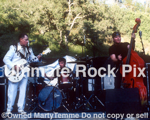 Photo of Jim Heath, Jimbo Wallace and Scott Churilla of The Reverend Horton Heat in concert by Marty Temme