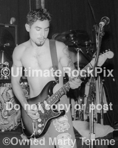 Black and white photo of Dave Navarro of The Red Hot Chili Peppers in concert in 1994 by Marty Temme