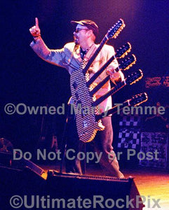 Photos of Rick Nielsen of Cheap Trick Playing His Hamer 5-Neck Guitar in Concert in 1997 by Marty Temme