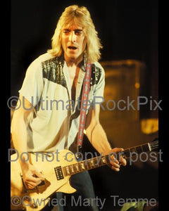 Photos of Mick Ronson Playing a Les Paul in 1980 by Marty Temme
