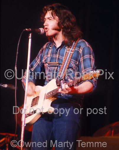 Photos of Guitar Player Rory Gallagher Playing his Fender Telecaster in Concert in 1973 by Marty Temme