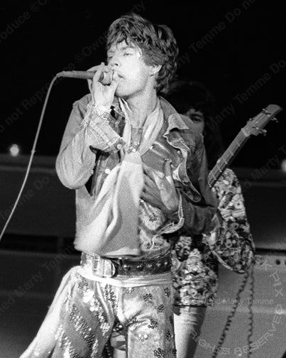 Photo of Mick Jagger of The Rolling Stones in concert in 1973 by Marty Temme